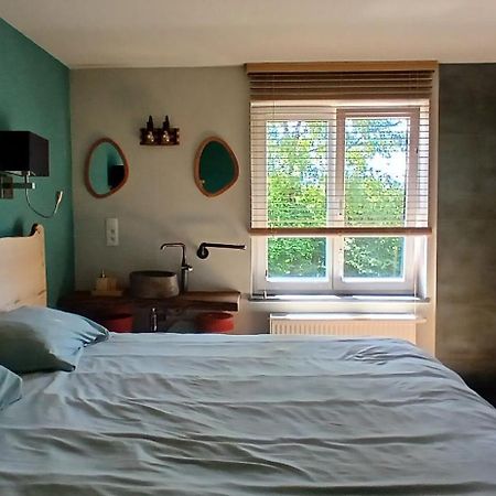 Le Harini Apartment Manhay Екстериор снимка